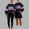 1013-a-team-sweater-oversize-caviar-violet-ray-1.webp A-Team Sweater Oversize - Caviar-Violet Ray