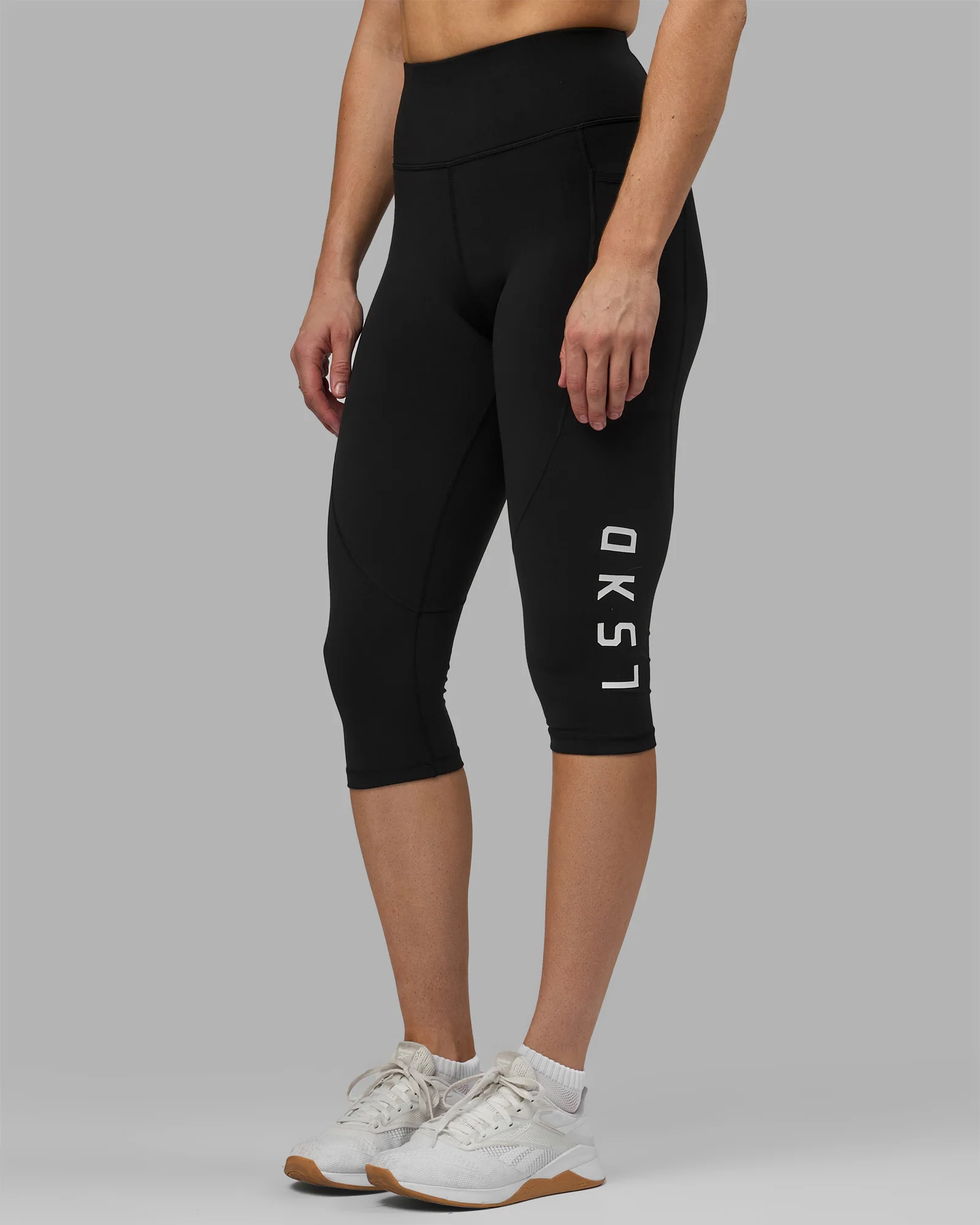 10212-rep-ultra-high-rise-3-4-legging-pockets-black-white-1.webp Rep Ultra High-Rise 3/4 Legging Pockets - Black-White