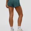 1084-accelerate-3-mid-rise-running-short-transformative-teal-marshmallow-5.webp Accelerate 3" Mid-Rise Running Short - Transformative Teal-Marshmallow