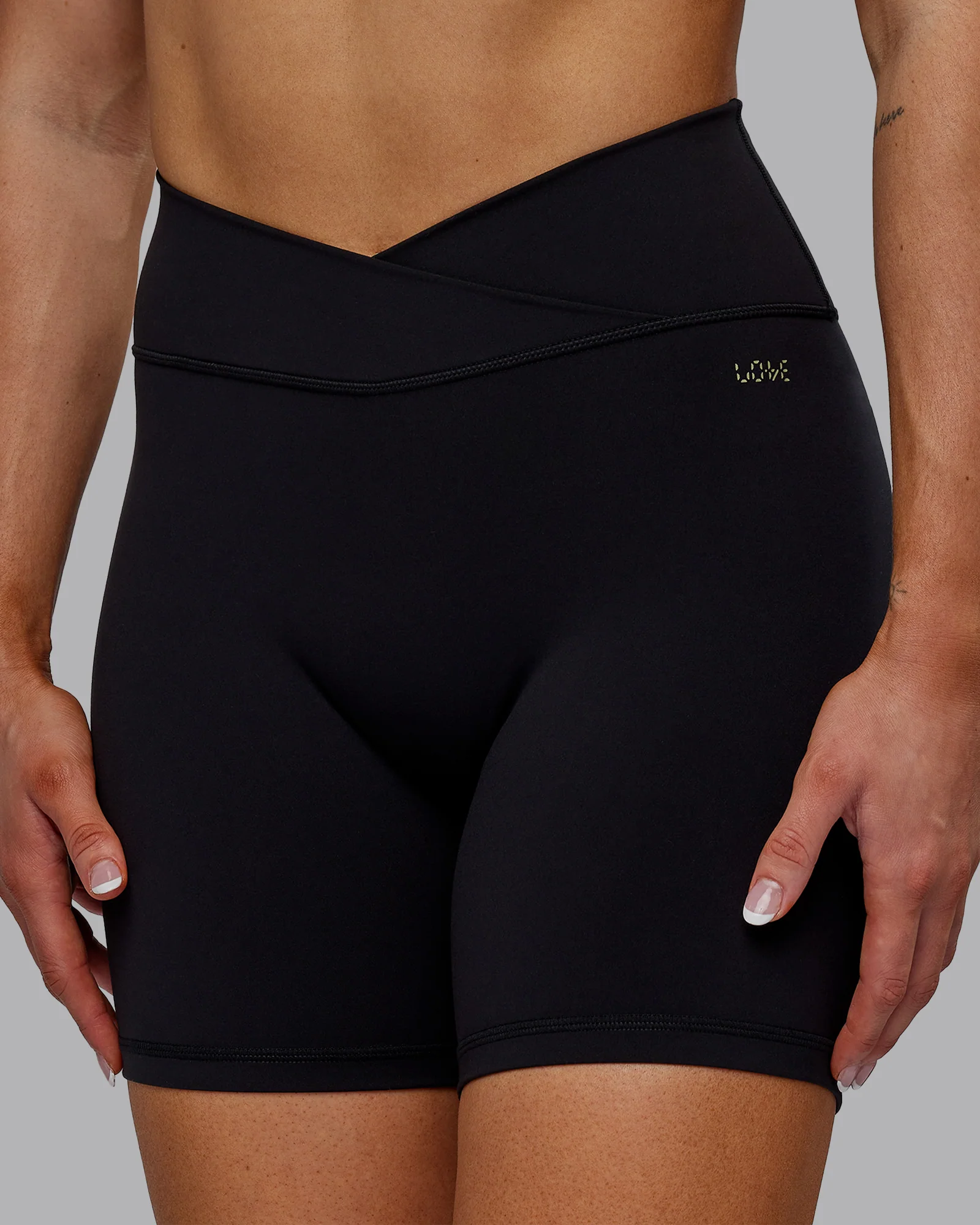 10946-sara-strike-ultra-high-rise-cross-over-waist-6-short-black-1.webp Sara Strike Ultra High-Rise Cross Over Waist 6" Short - Black