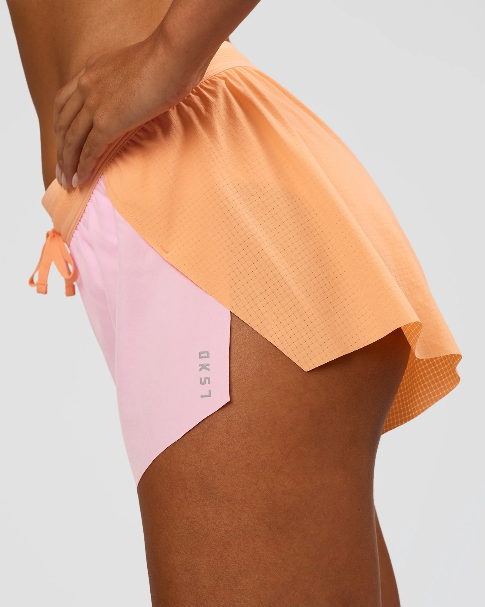 11855-accelerate-3-mid-rise-running-short-cantaloupe-marshmallow-6.webp Accelerate 3" Mid-Rise Running Short - Cantaloupe-Marshmallow