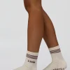 12592-motion-pilates-grip-socks-off-white-hot-chocolate-2.webp Motion Pilates Grip Socks - Off White-Hot Chocolate