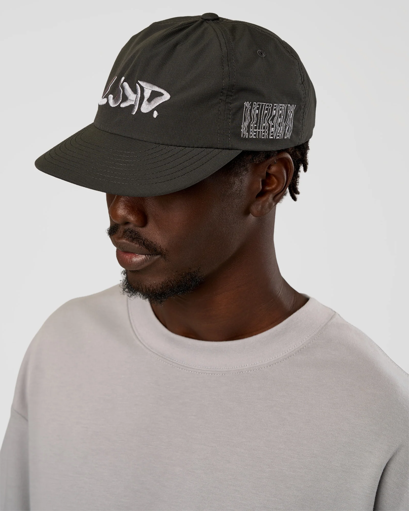 12652-static-grit-pinch-panel-cap-dark-storm-1.webp Static Grit Pinch Panel Cap - Dark Storm