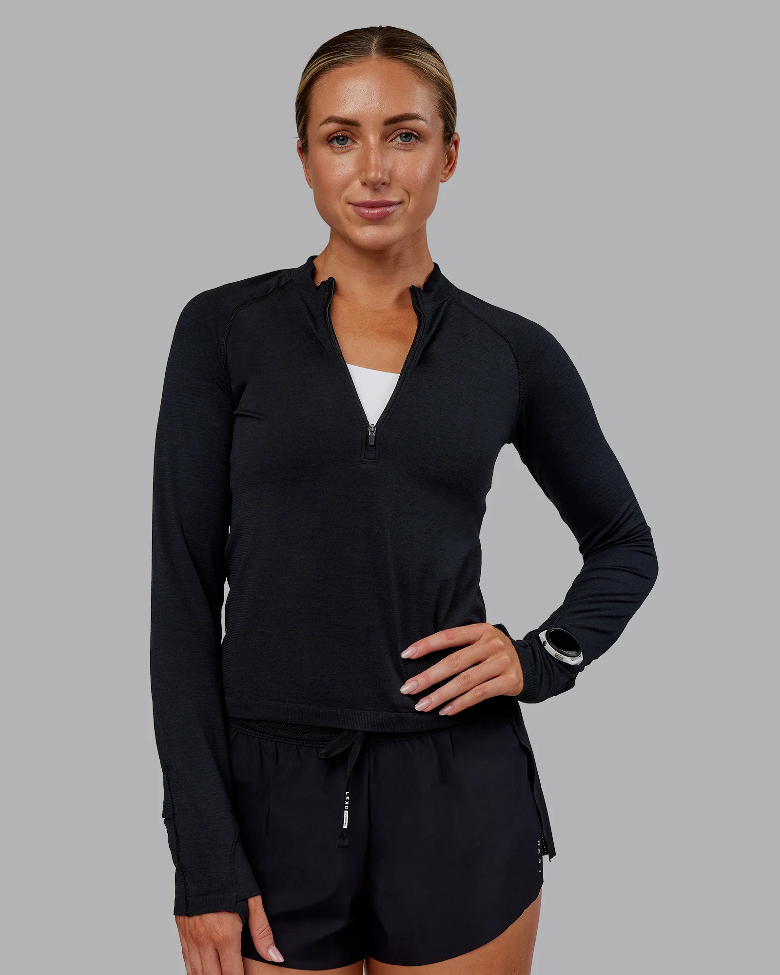 12705-aeroflx-long-sleeve-half-zip-black-marl-1.webp AeroFLX+ Long Sleeve Half Zip - Black Marl