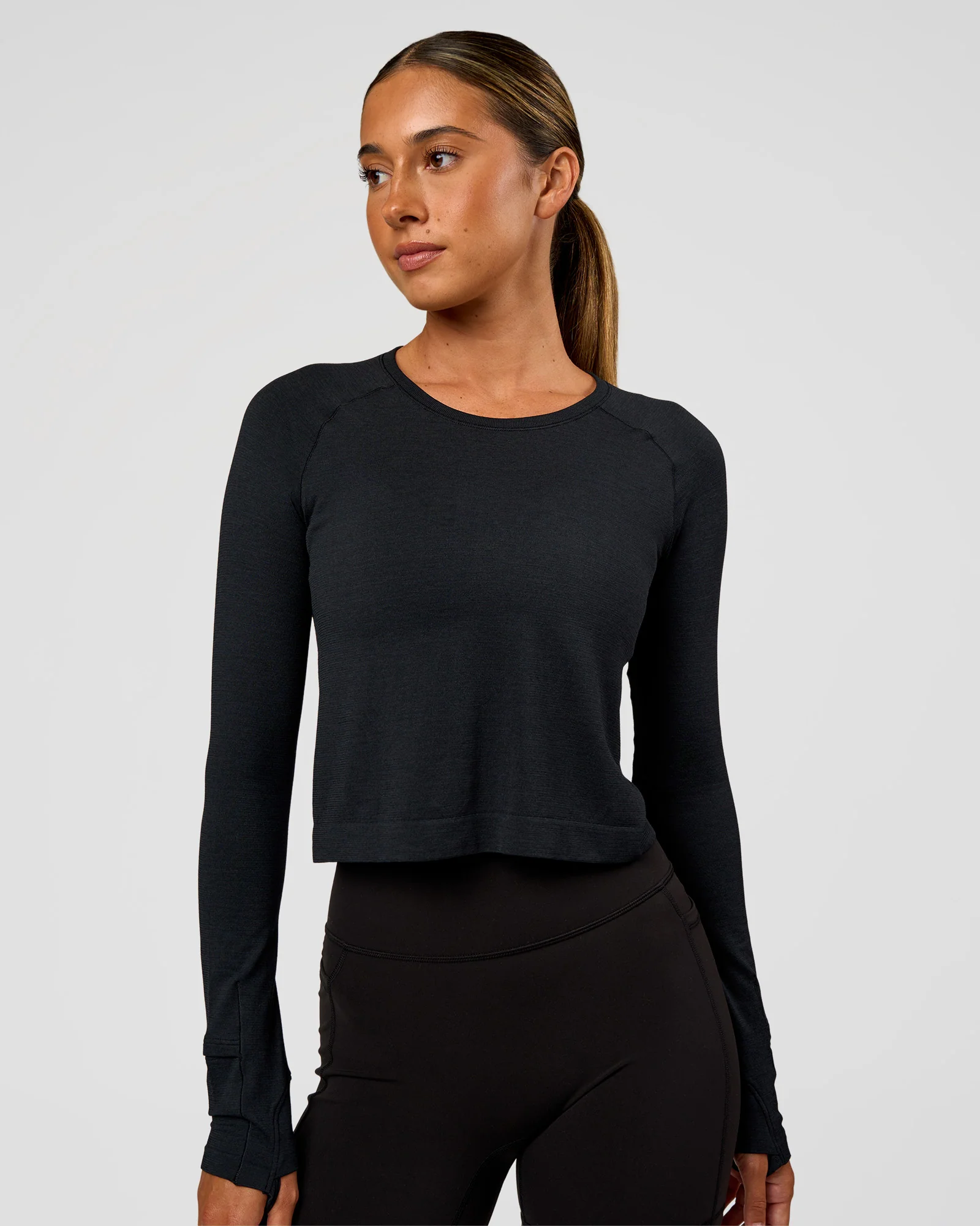 12753-aeroflx-seamless-long-sleeve-skimmer-tee-black-marl-1.webp AeroFLX+ Seamless Long Sleeve Skimmer Tee - Black Marl