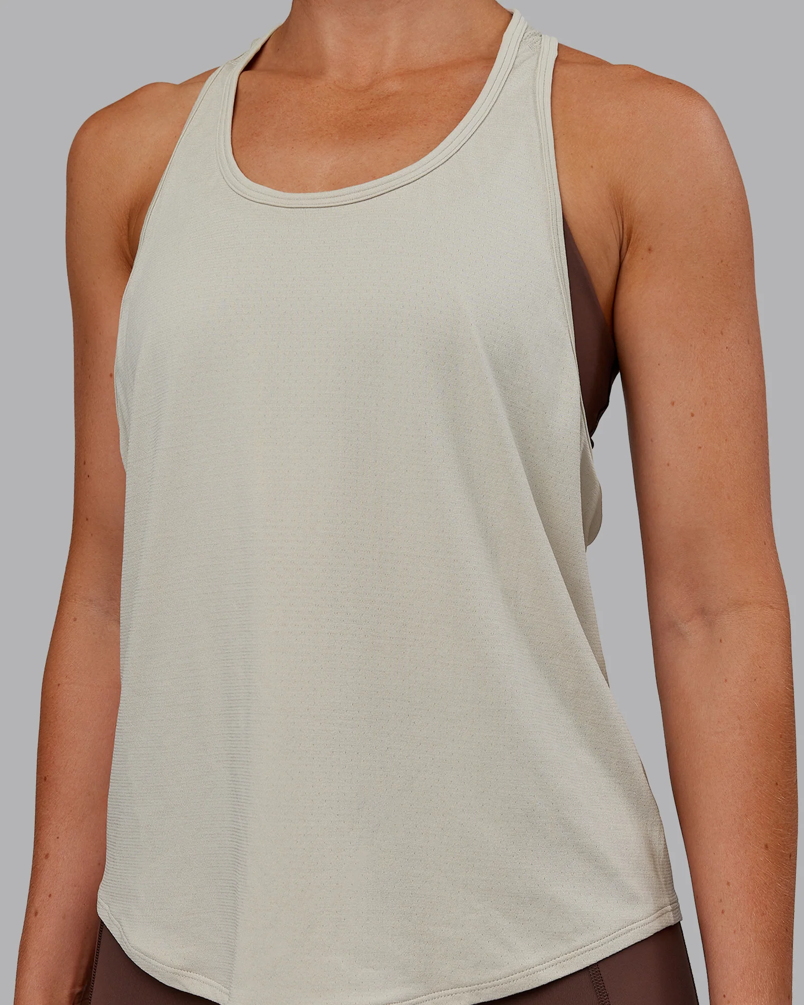 12777-aeroflx-drop-armhole-seamless-tank-shale-beige-shale-beige-10.webp AeroFLX+ Drop Armhole Seamless Tank - Shale Beige/Shale Beige