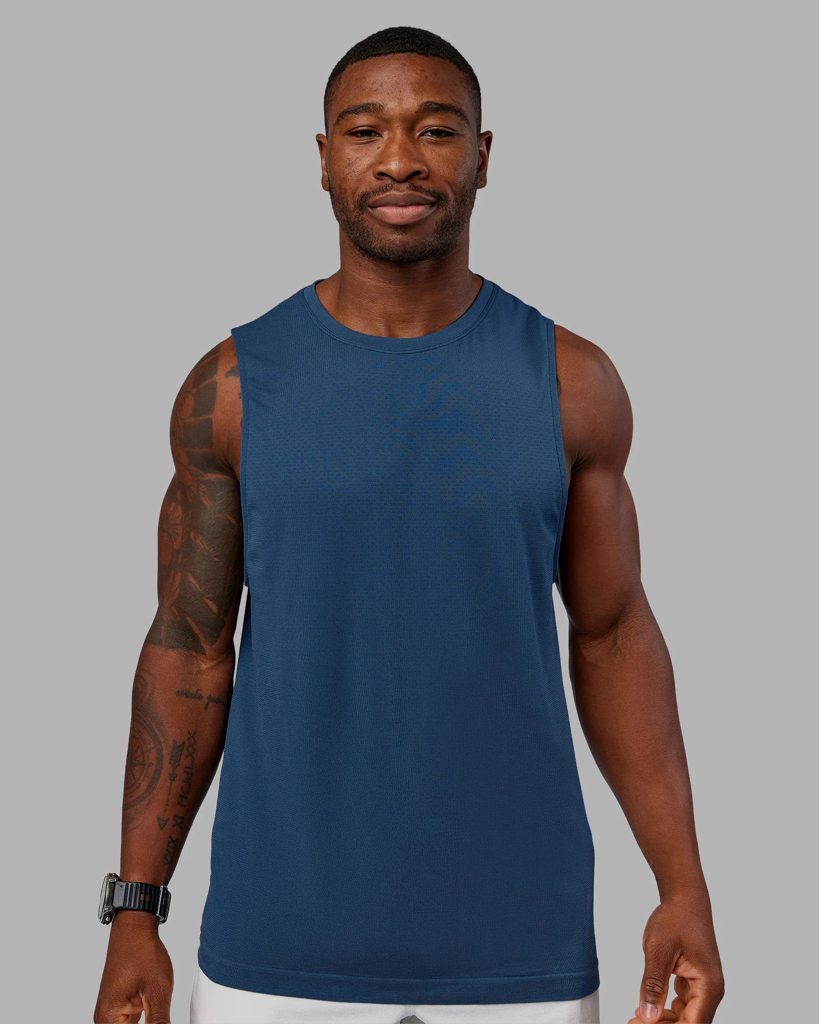 13017-aeroflx-seamless-muscle-tank-indigo-1.webp AeroFLX+ Seamless Muscle Tank - Indigo