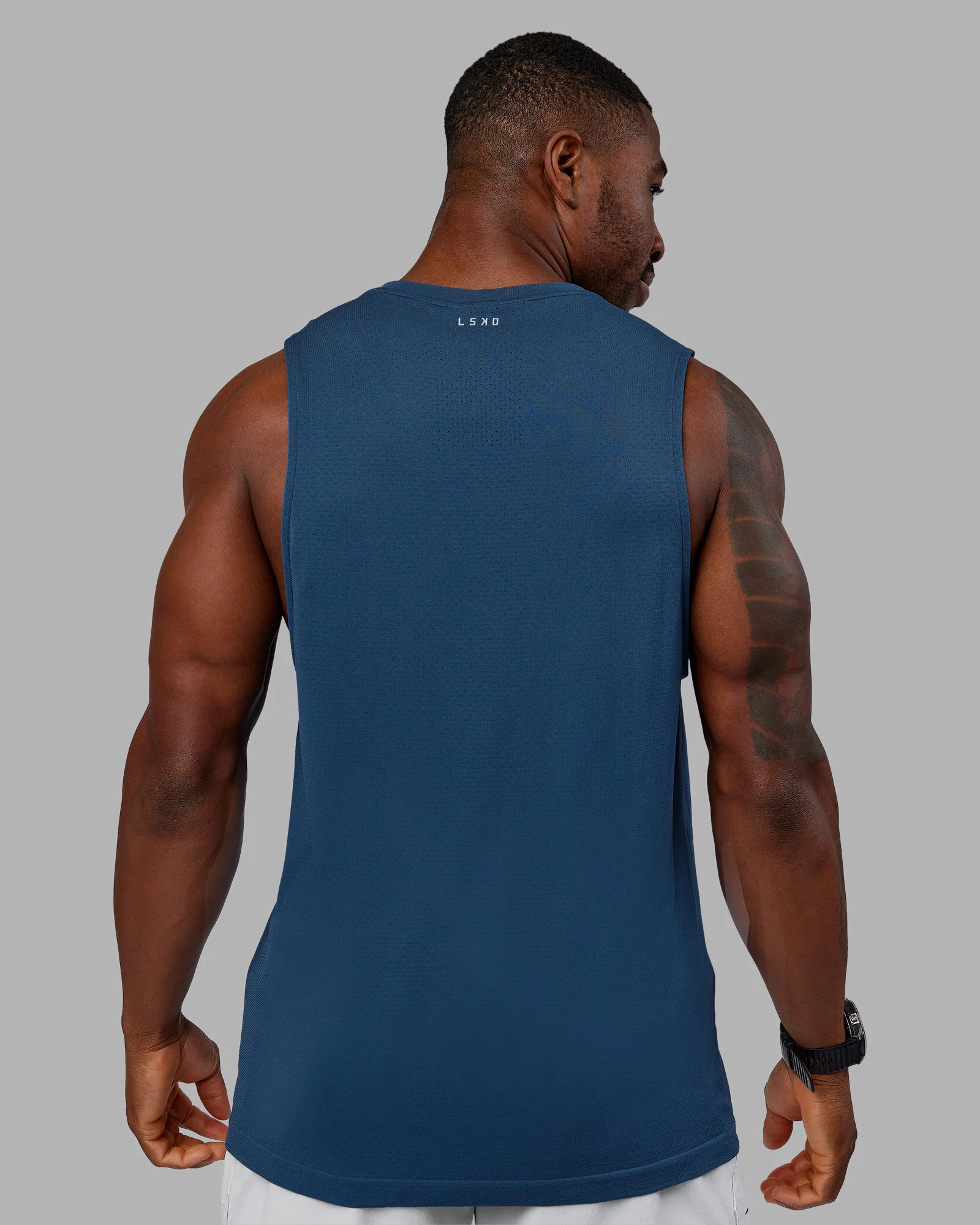 13017-aeroflx-seamless-muscle-tank-indigo-3.webp AeroFLX+ Seamless Muscle Tank - Indigo