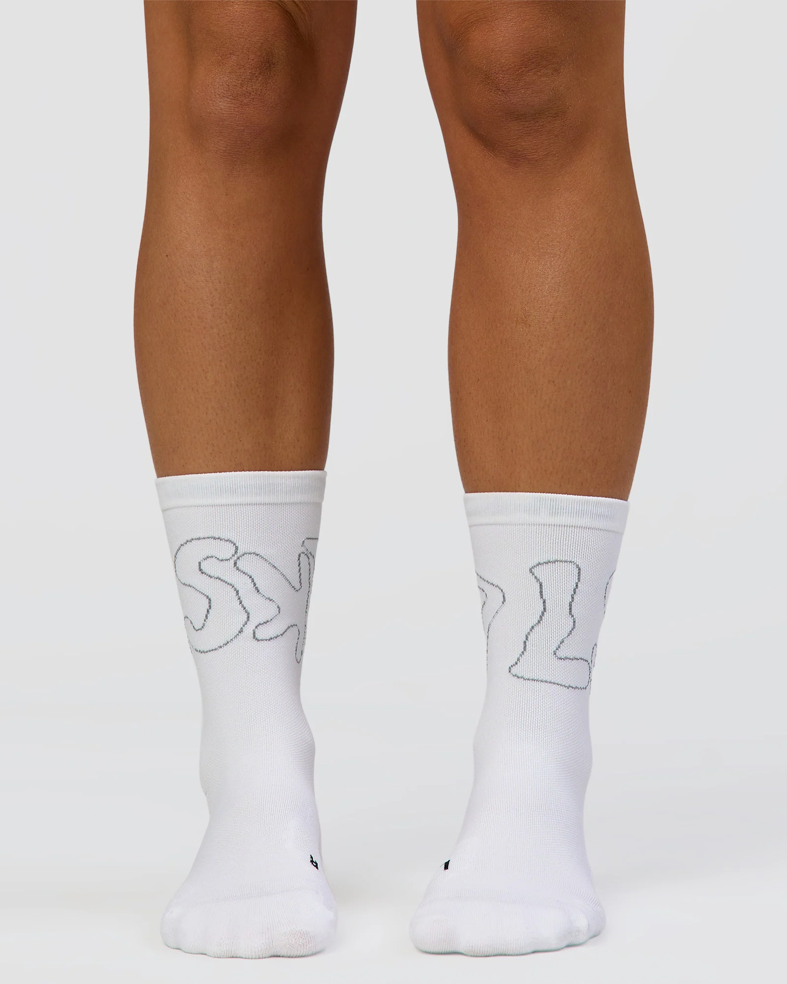 1329-motion-performance-crew-socks-white-reflective-3.webp Motion Performance Crew Socks - White-Reflective