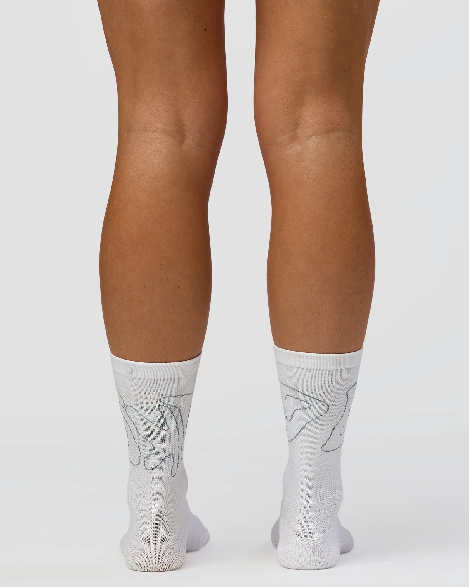 1329-motion-performance-crew-socks-white-reflective-4.webp Motion Performance Crew Socks - White-Reflective
