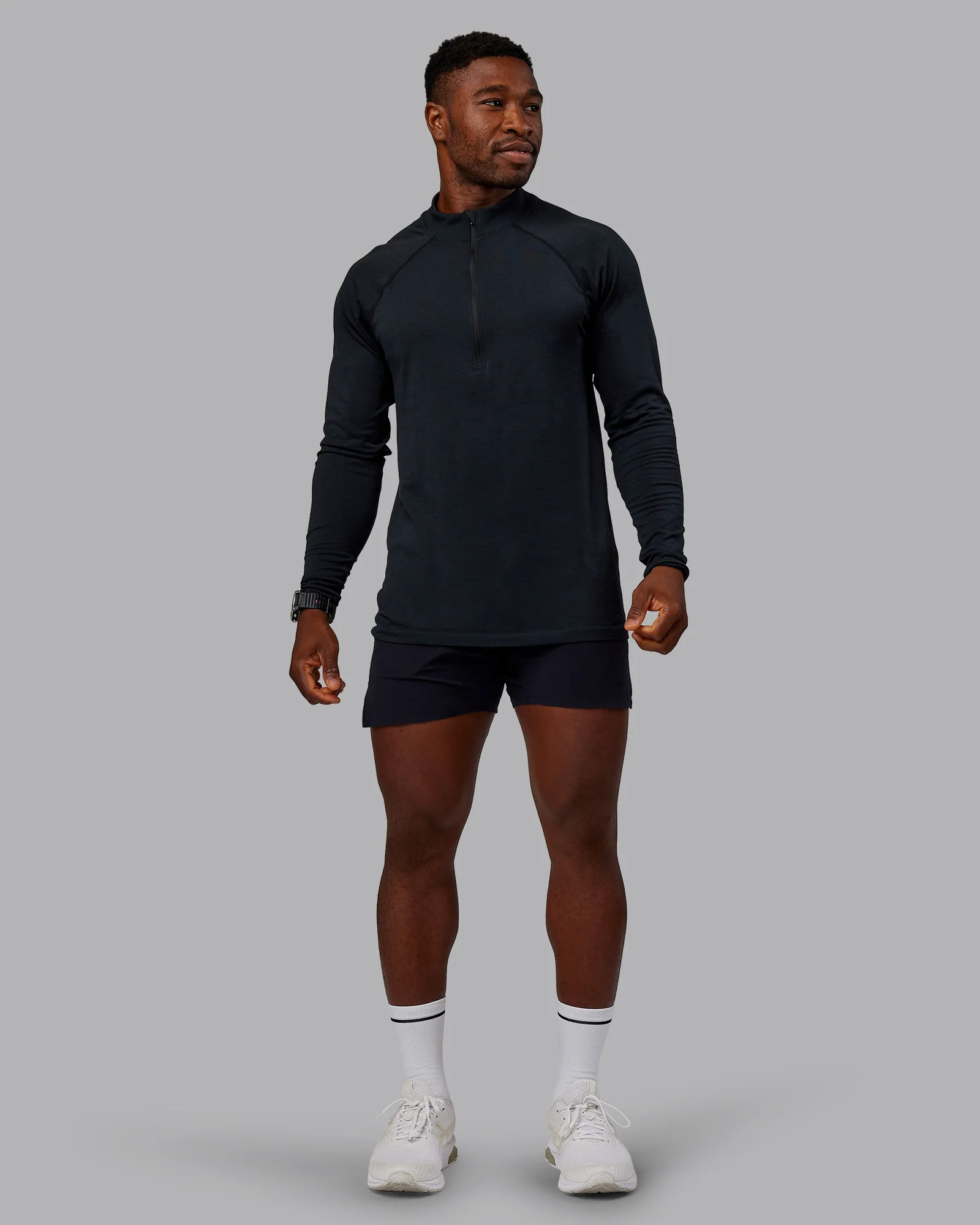 1361-aeroflx-seamless-half-zip-long-sleeve-tee-black-marl-1.webp AeroFLX+ Seamless Half Zip Long Sleeve Tee - Black Marl