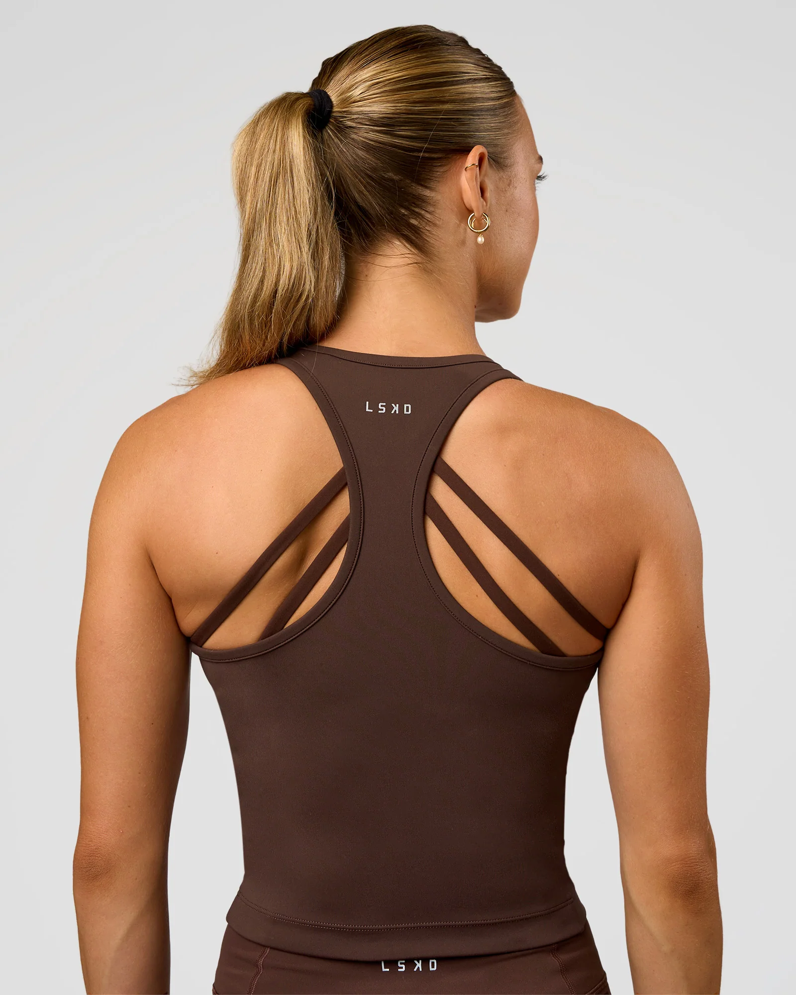 139-flow-performance-tank-2.0-hot-chocolate-3.webp Flow Performance Tank 2.0 - Hot Chocolate