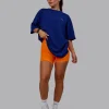 Unisex Strike Through FLXCotton Tee Oversize - Midnight Blue-Vibrant Orange