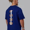 Unisex Strike Through FLXCotton Tee Oversize - Midnight Blue-Vibrant Orange