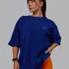 Unisex Strike Through FLXCotton Tee Oversize - Midnight Blue-Vibrant Orange