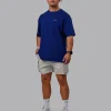 Unisex Strike Through FLXCotton Tee Oversize - Midnight Blue-Vibrant Orange