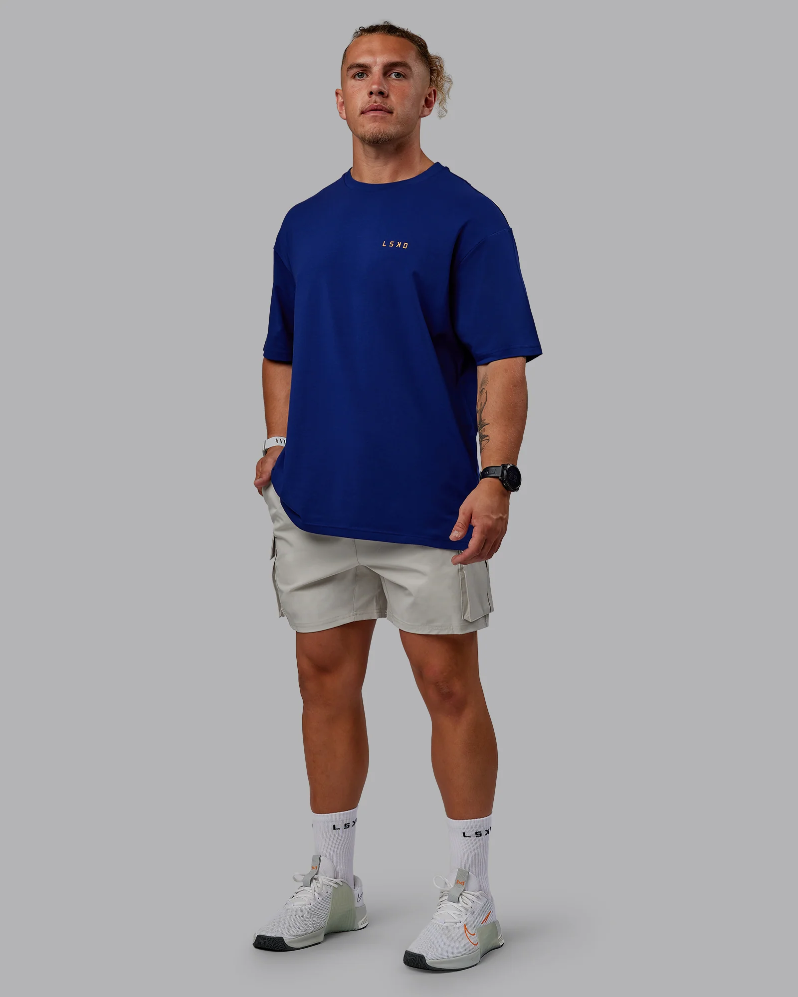Unisex Strike Through FLXCotton Tee Oversize - Midnight Blue-Vibrant Orange