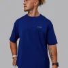 Unisex Strike Through FLXCotton Tee Oversize - Midnight Blue-Vibrant Orange