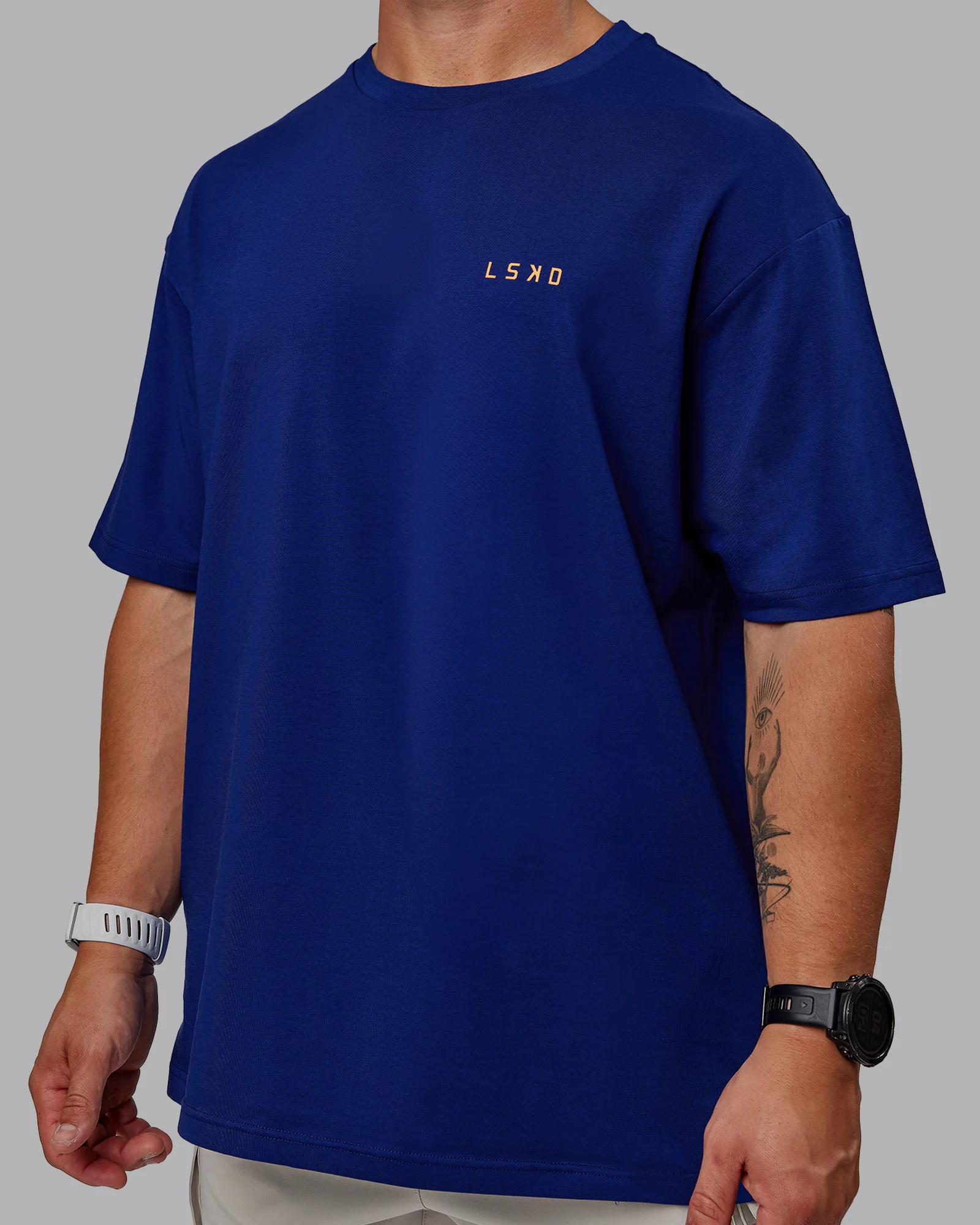 Unisex Strike Through FLXCotton Tee Oversize - Midnight Blue-Vibrant Orange