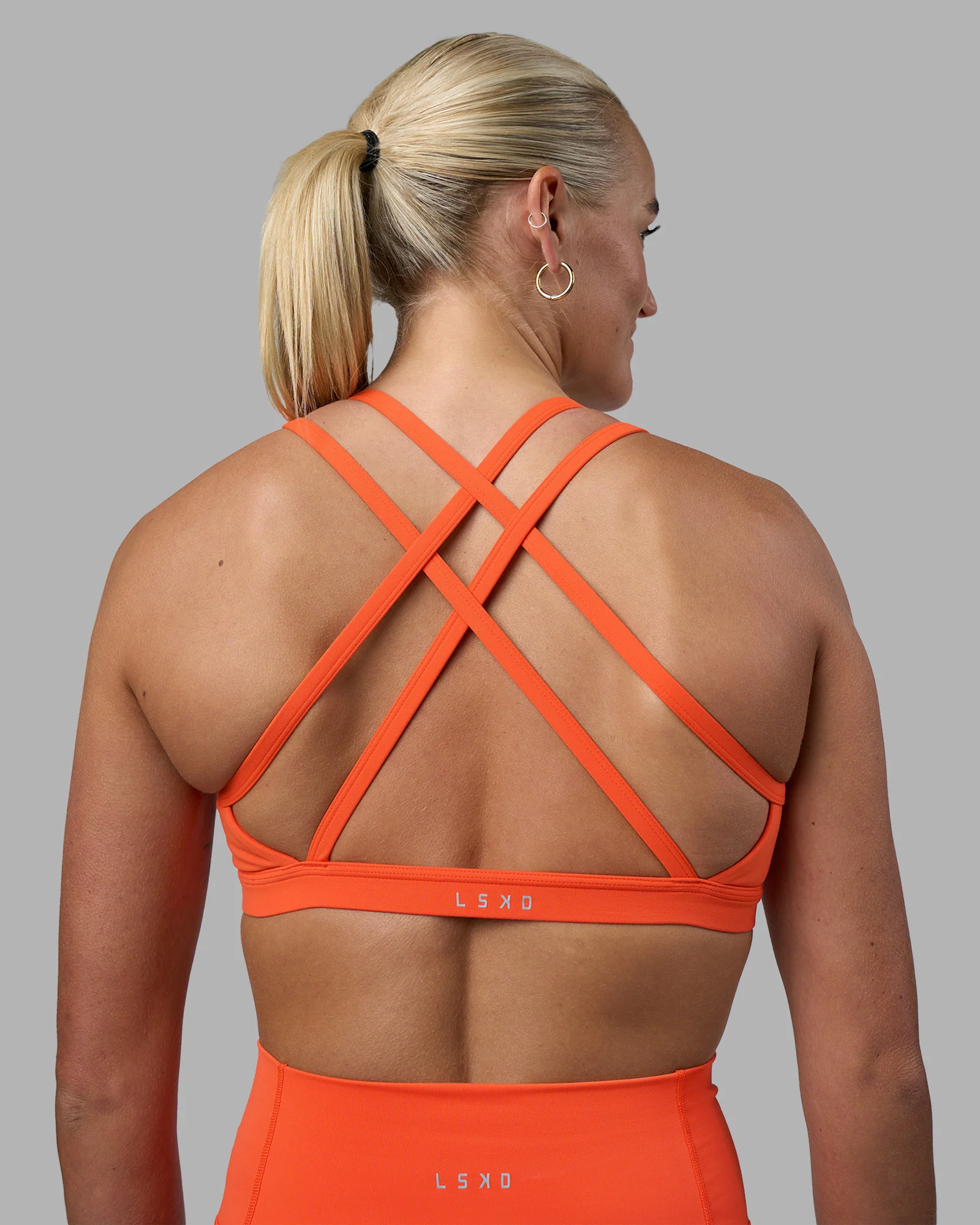 17964-velocity-sports-bra-ultra-orange-1.webp Velocity Sports Bra - Ultra Orange