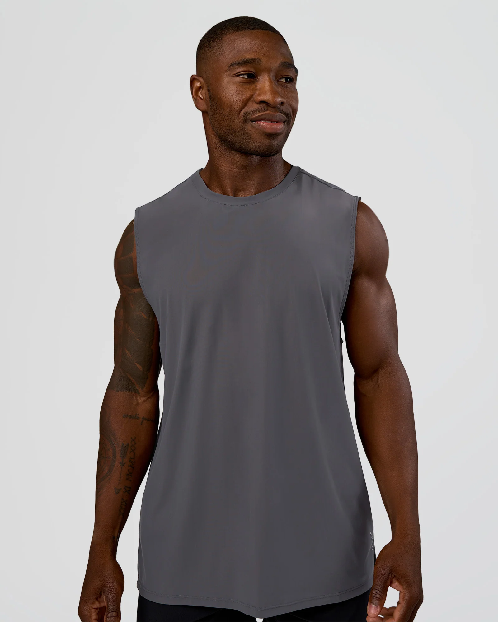 20944-cadence-micromotion-muscle-tank-dark-storm-1.webp Cadence MicroMotion Muscle Tank - Dark Storm