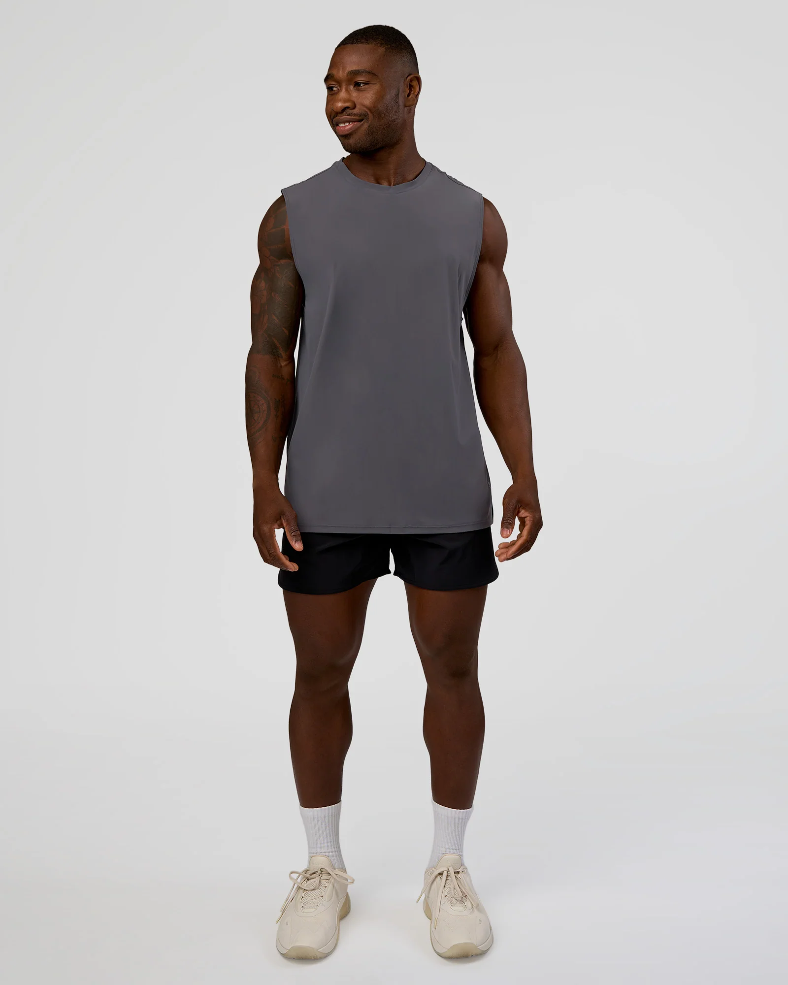 20944-cadence-micromotion-muscle-tank-dark-storm-2.webp Cadence MicroMotion Muscle Tank - Dark Storm