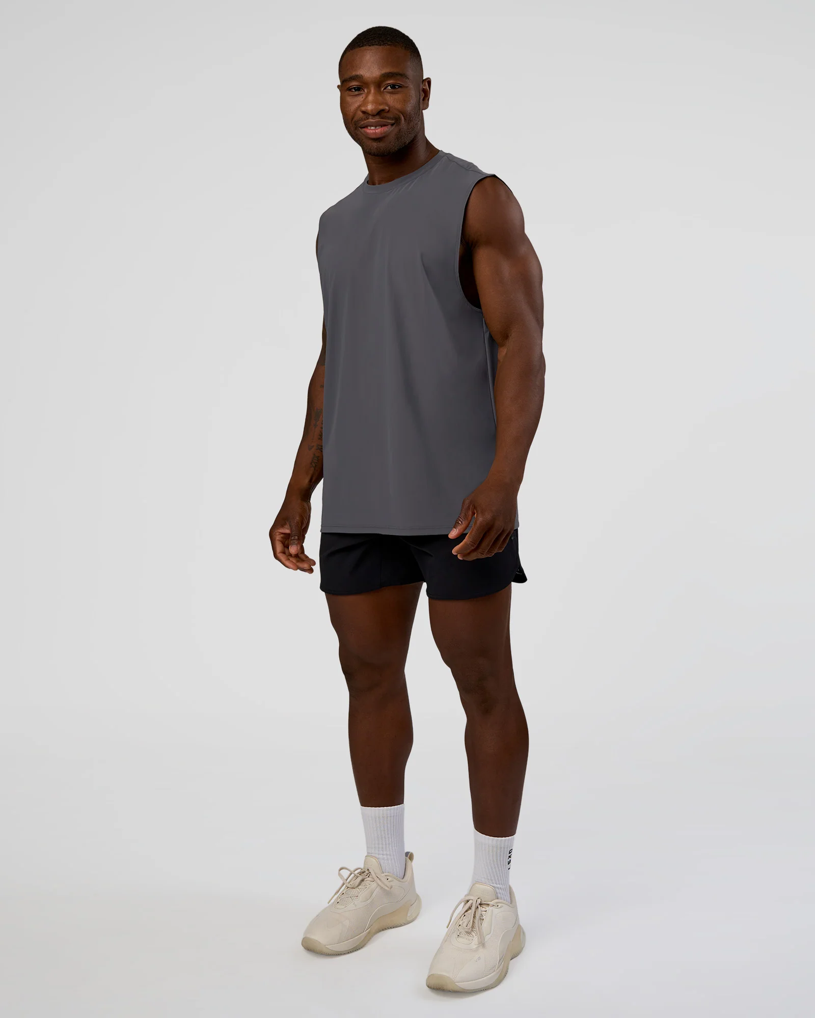 20944-cadence-micromotion-muscle-tank-dark-storm-5.webp Cadence MicroMotion Muscle Tank - Dark Storm