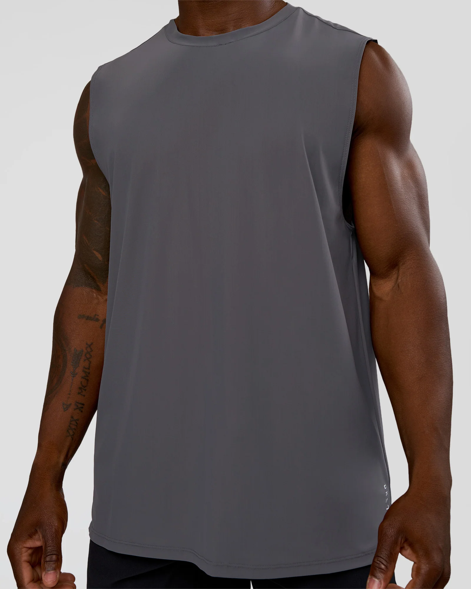 20944-cadence-micromotion-muscle-tank-dark-storm-6.webp Cadence MicroMotion Muscle Tank - Dark Storm