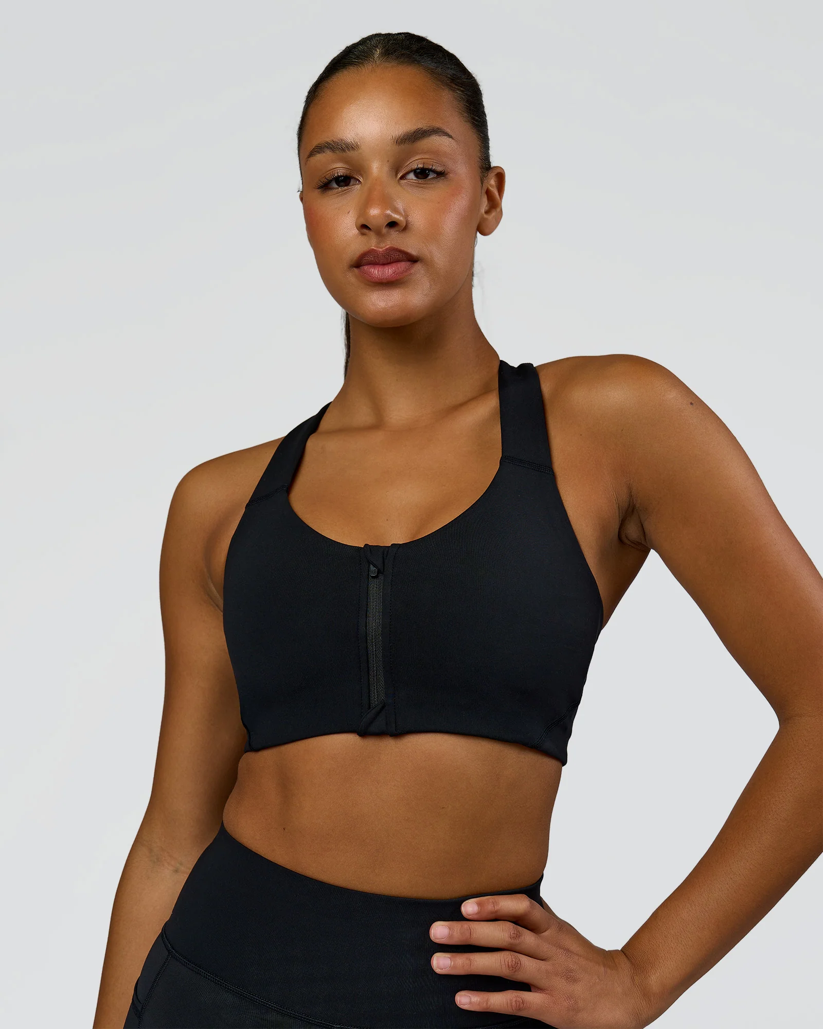 2144-elarra-zip-front-sports-bra-black-1.webp Elarra Zip Front Sports Bra - Black