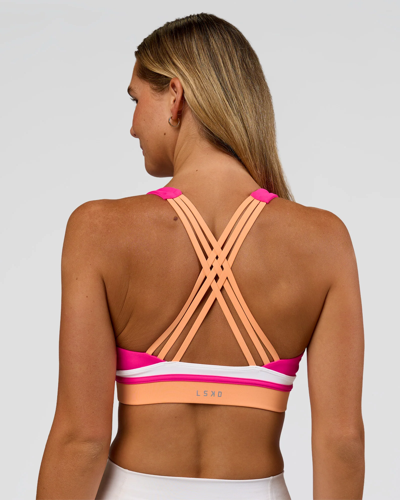 2451-revitalise-flash-sports-bra-ultra-pink-cantaloupe-white-1.webp Revitalise Flash Sports Bra - Ultra Pink-Cantaloupe-White