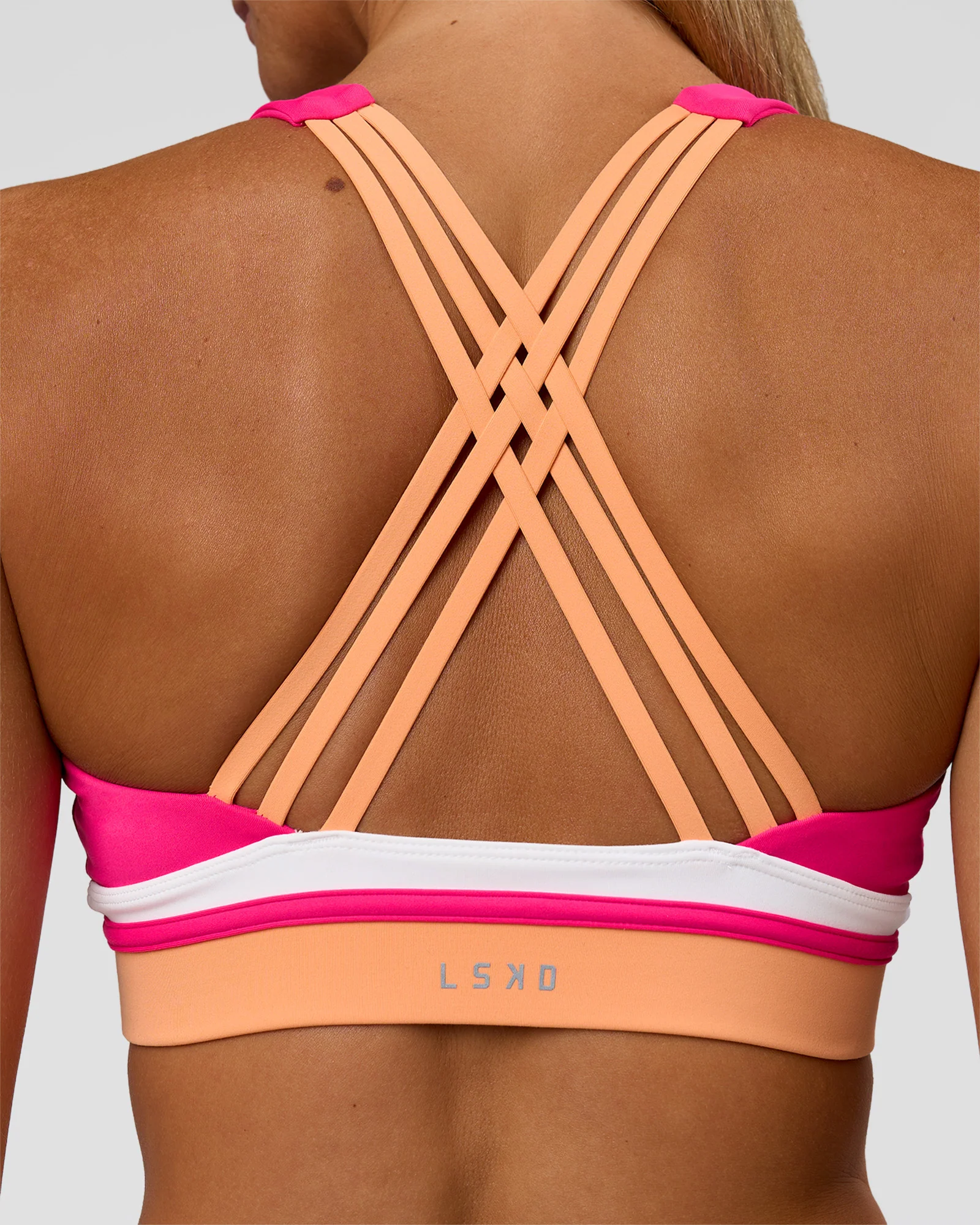 2451-revitalise-flash-sports-bra-ultra-pink-cantaloupe-white-4.webp Revitalise Flash Sports Bra - Ultra Pink-Cantaloupe-White