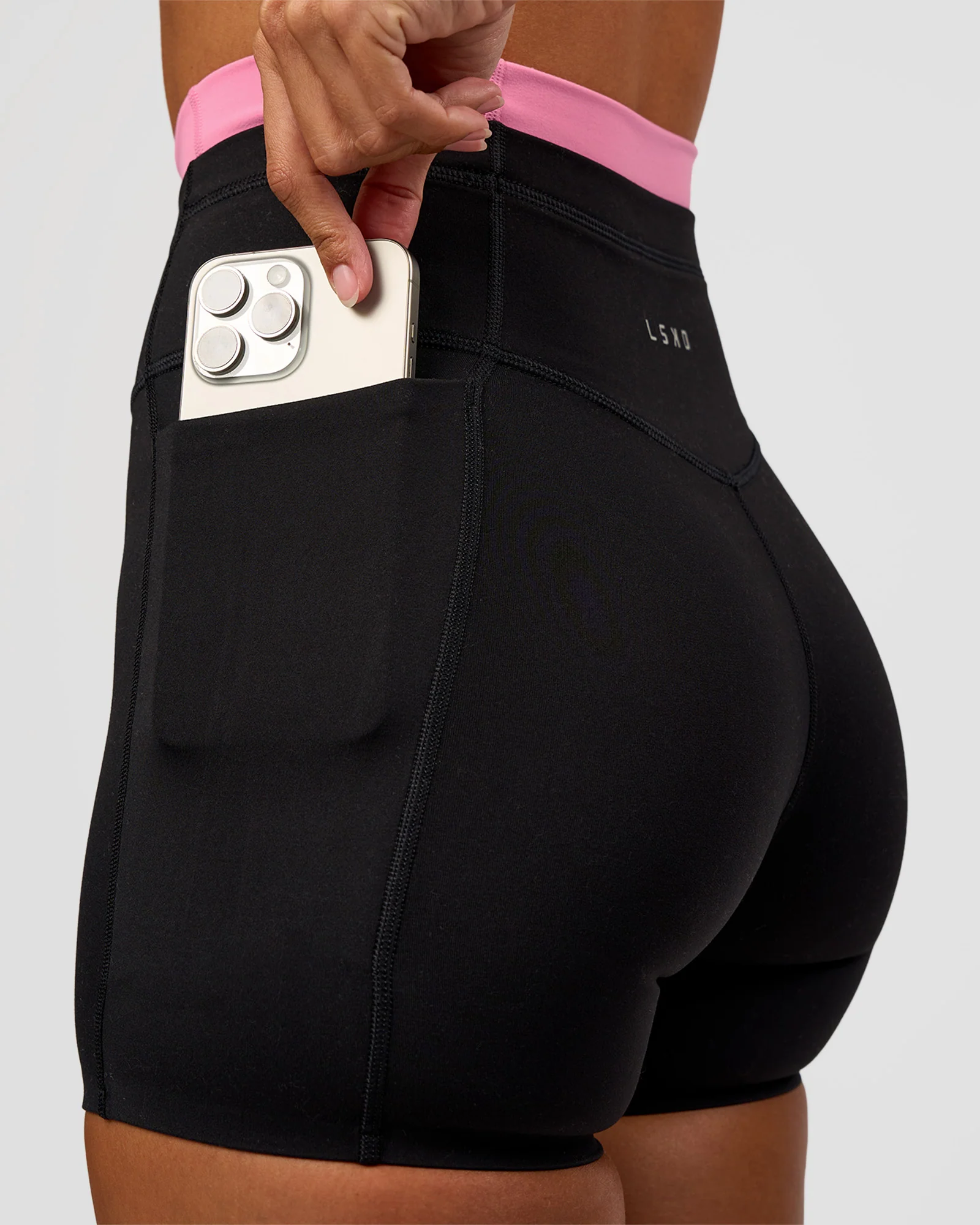 2836-liberate-high-rise-4-short-pockets-black-candy-pink-2.webp Liberate High-Rise 4" Short Pockets - Black-Candy Pink