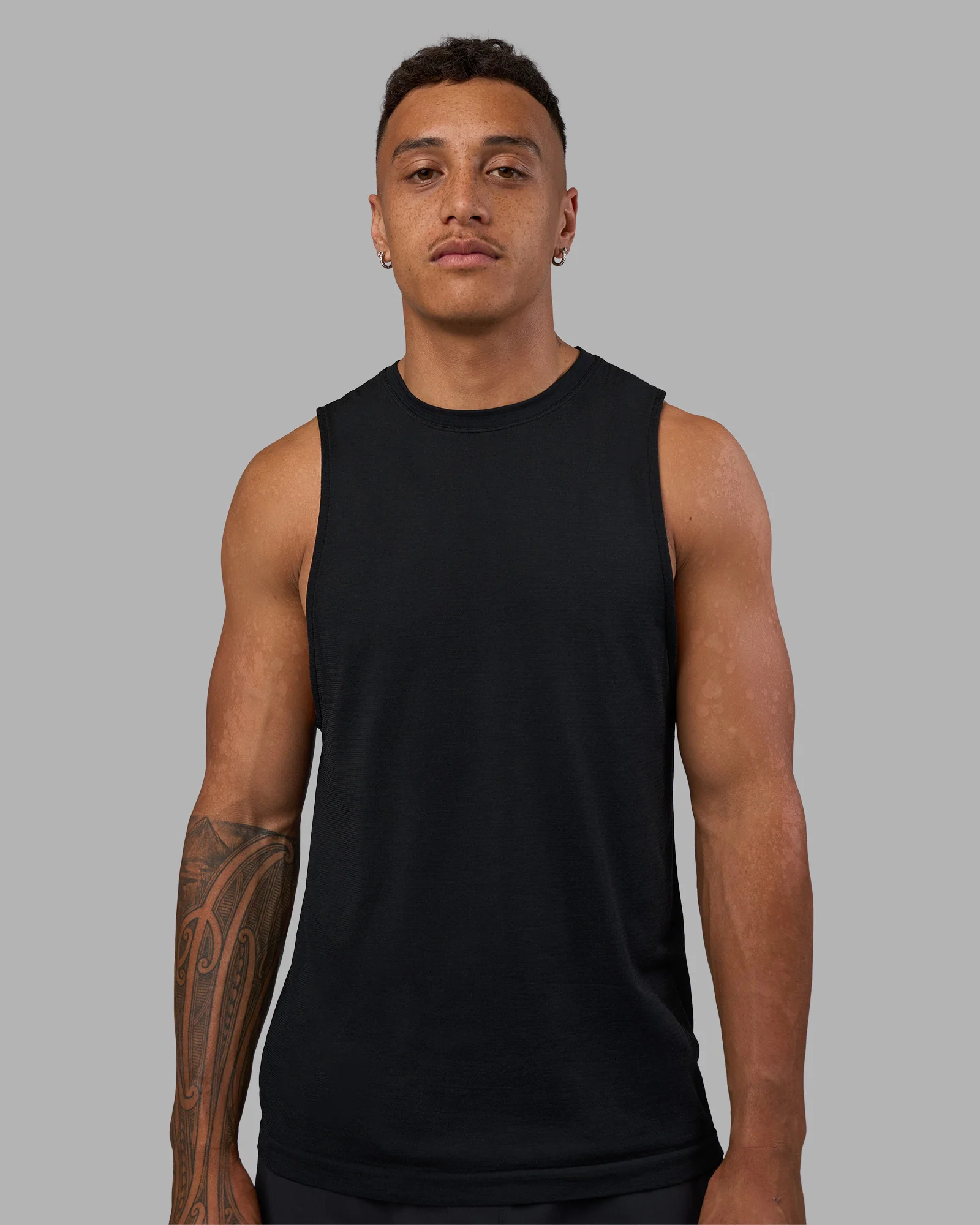 3932-aeroflx-seamless-muscle-tank-black-marl-1.webp AeroFLX+ Seamless Muscle Tank - Black Marl