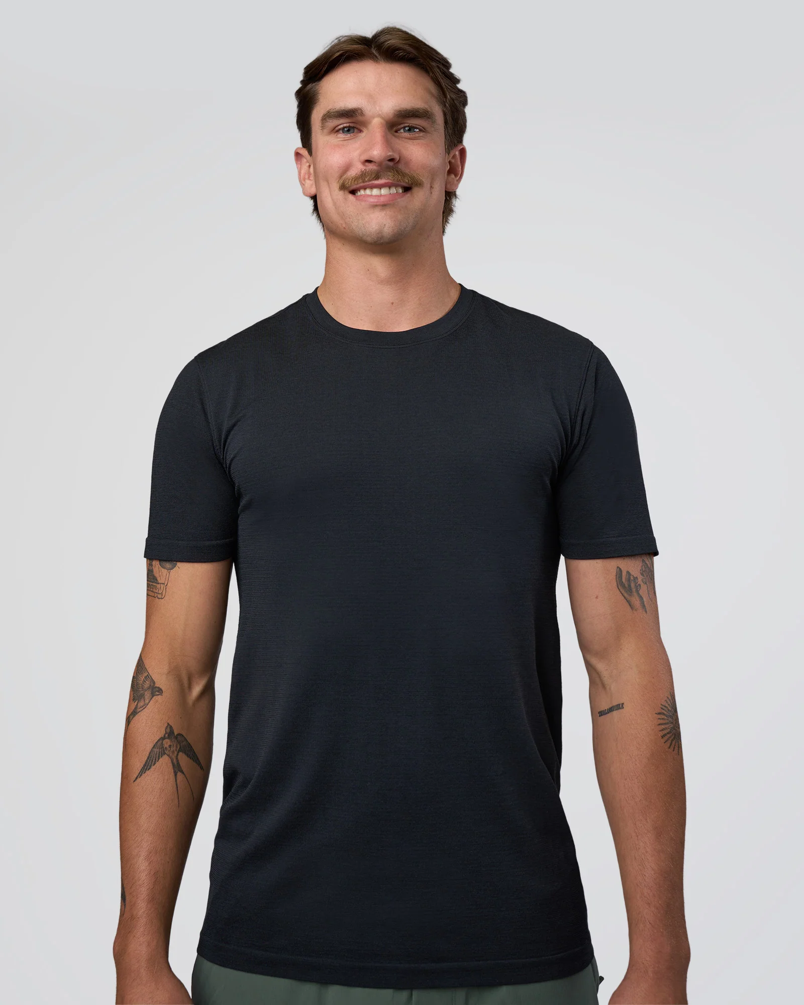 3956-aeroflx-seamless-set-in-tee-black-marl-1.webp AeroFLX+ Seamless Set In Tee - Black Marl
