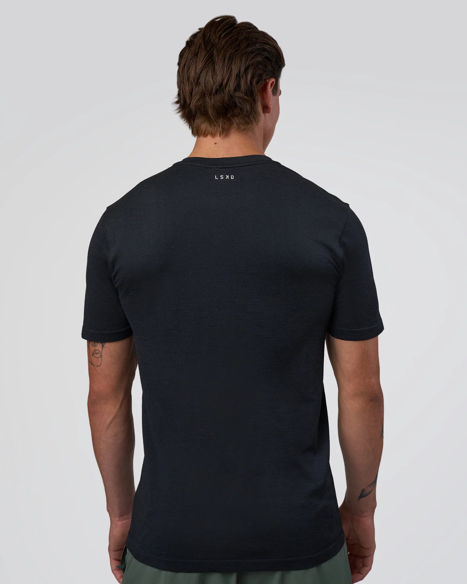 3956-aeroflx-seamless-set-in-tee-black-marl-3.webp AeroFLX+ Seamless Set In Tee - Black Marl