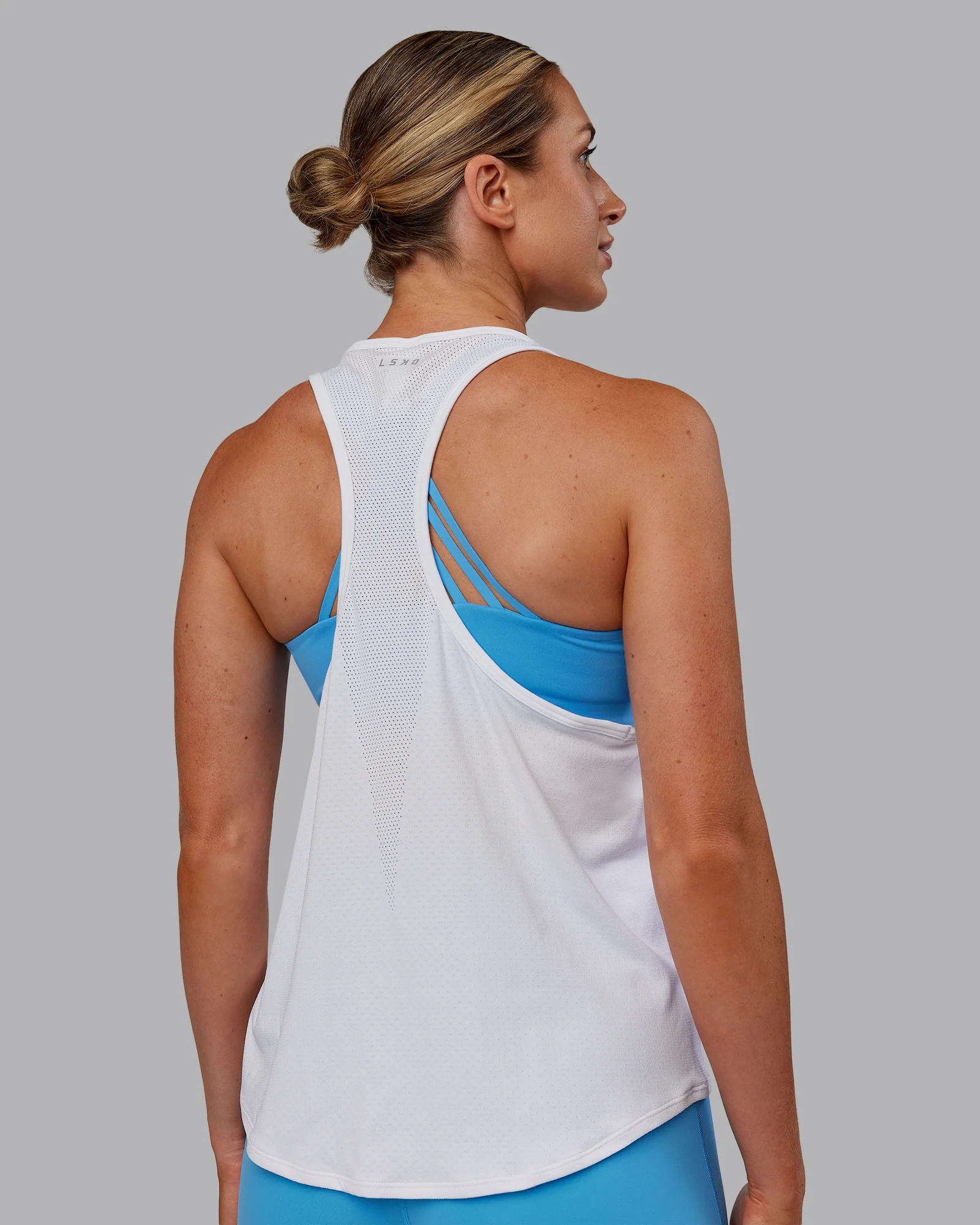 4802-aeroflx-drop-armhole-seamless-tank-white-white-1.webp AeroFLX+ Drop Armhole Seamless Tank - White/White