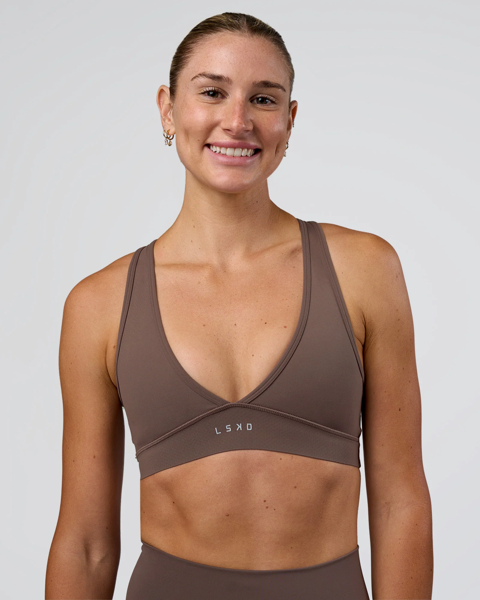 5510-stamina-sports-bra-peppercorn-1.webp Stamina Sports Bra - Peppercorn