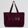 562-hold-it-all-canvas-tote-cherry-lacquer-1.jpg Hold It All Canvas Tote - Cherry Lacquer