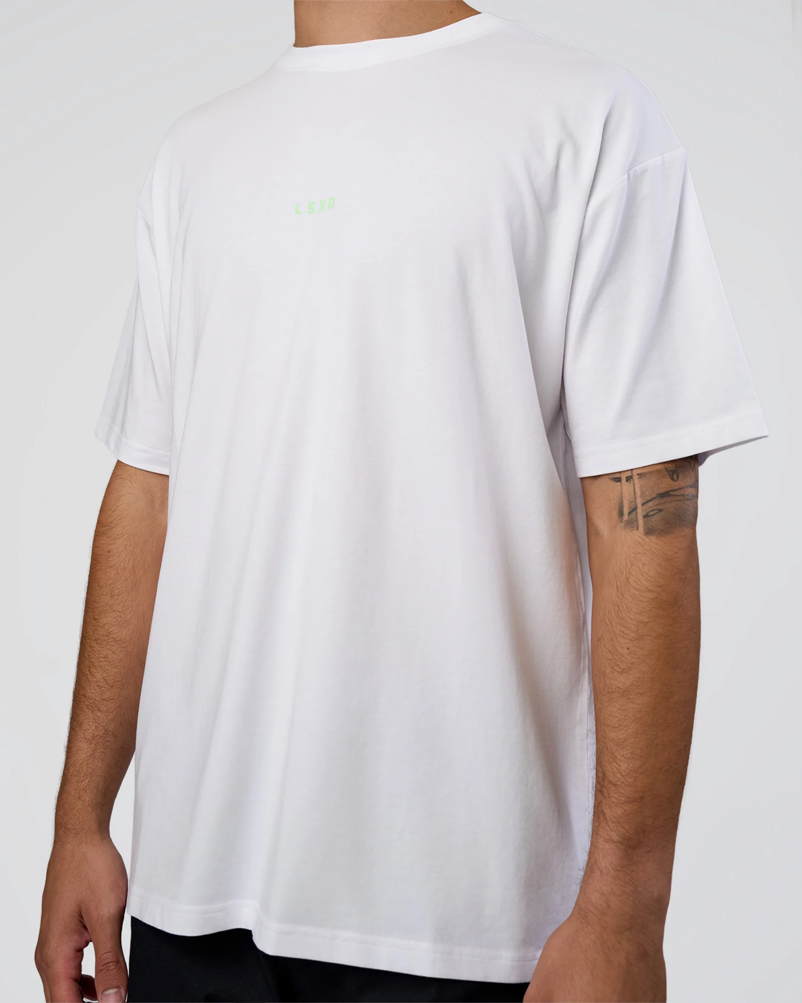 5724-together-we-rise-flxcotton-oversized-tee-white-solar-lime-7.webp Together We Rise FLXCotton Oversized Tee - White-Solar Lime