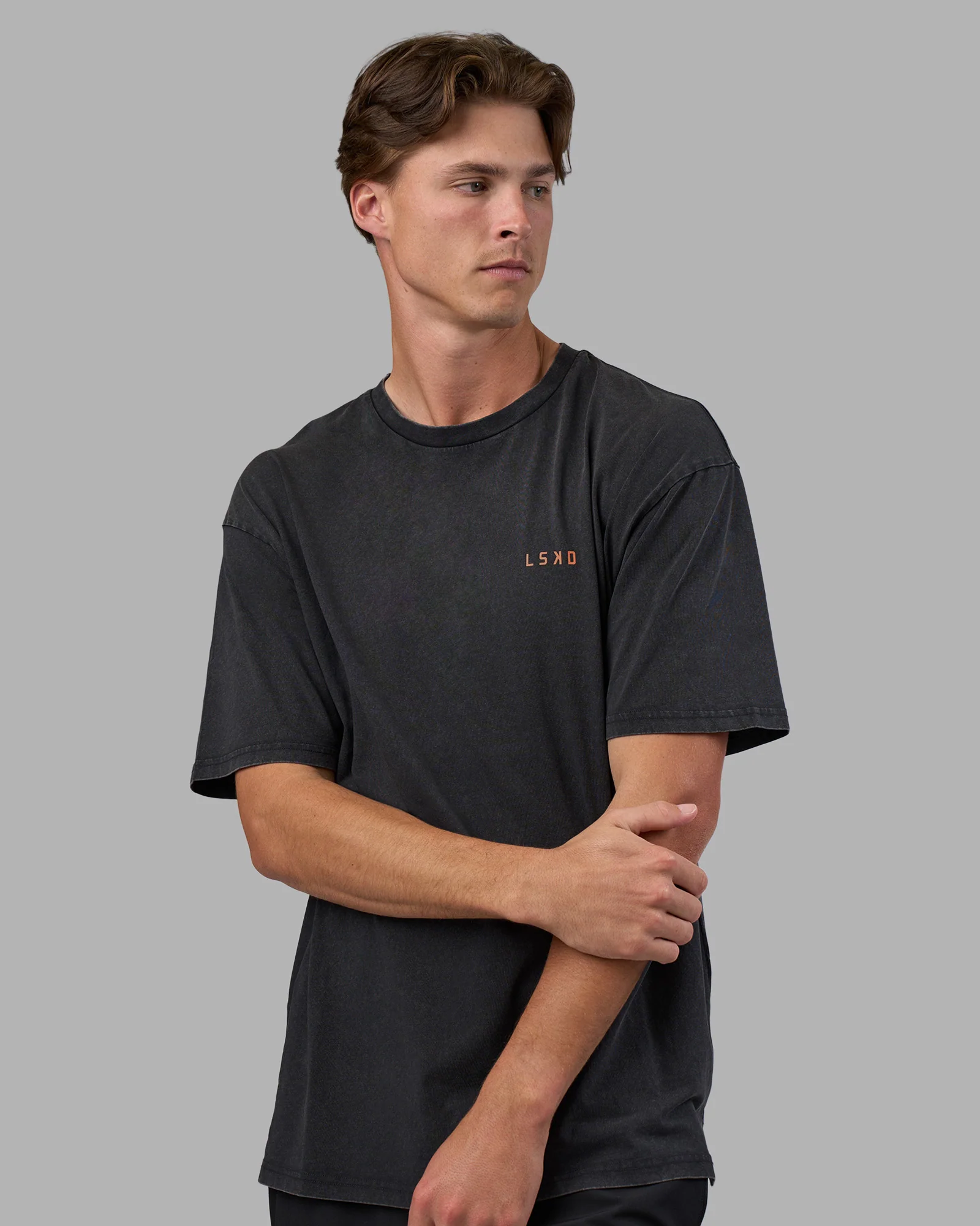 5733-unisex-strike-through-flxcotton-tee-oversize-black-washed-cantaloupe-3.webp Unisex Strike Through FLXCotton Tee Oversize - Black Washed-Cantaloupe