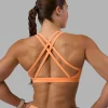 5847-velocity-sports-bra-cantaloupe-1.webp Velocity Sports Bra - Cantaloupe