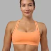 5847-velocity-sports-bra-cantaloupe-2.webp Velocity Sports Bra - Cantaloupe