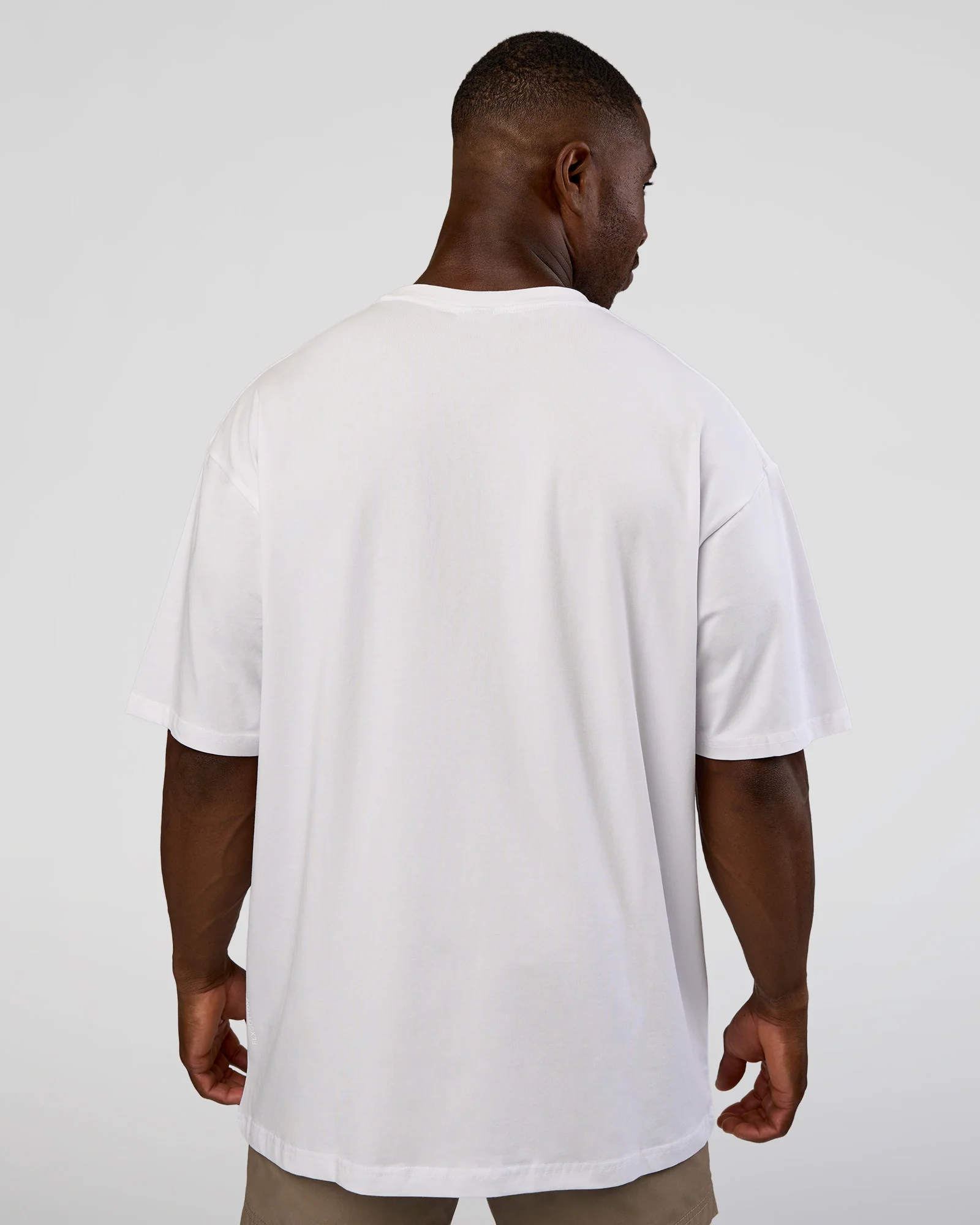 6001-nothing-is-impossible-flxcotton-oversized-tee-white-vital-green-6.webp Nothing Is Impossible FLXCotton Oversized Tee - White-Vital Green