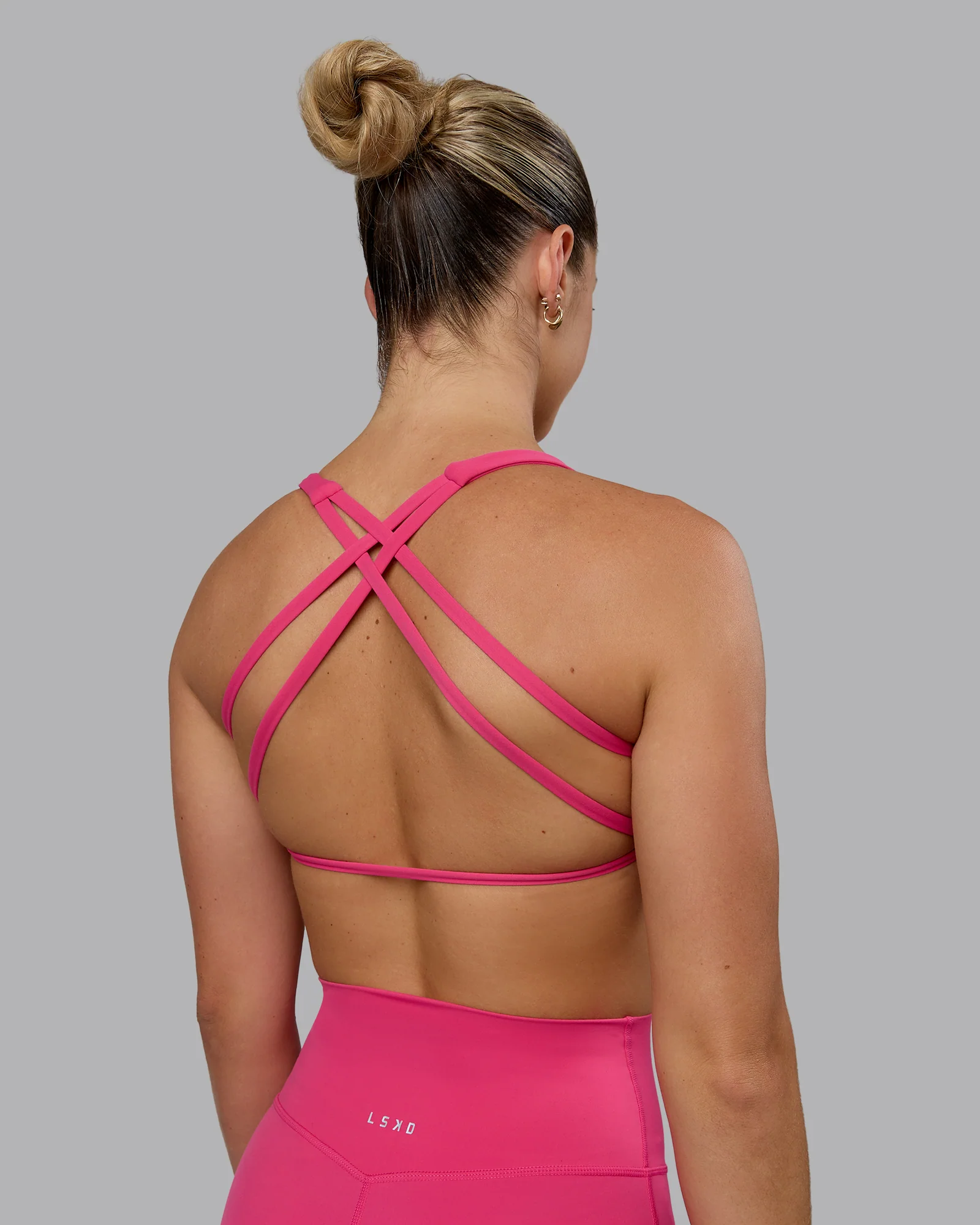 6081-aspire-sports-bra-pink-flash-1.webp Aspire Sports Bra - Pink Flash