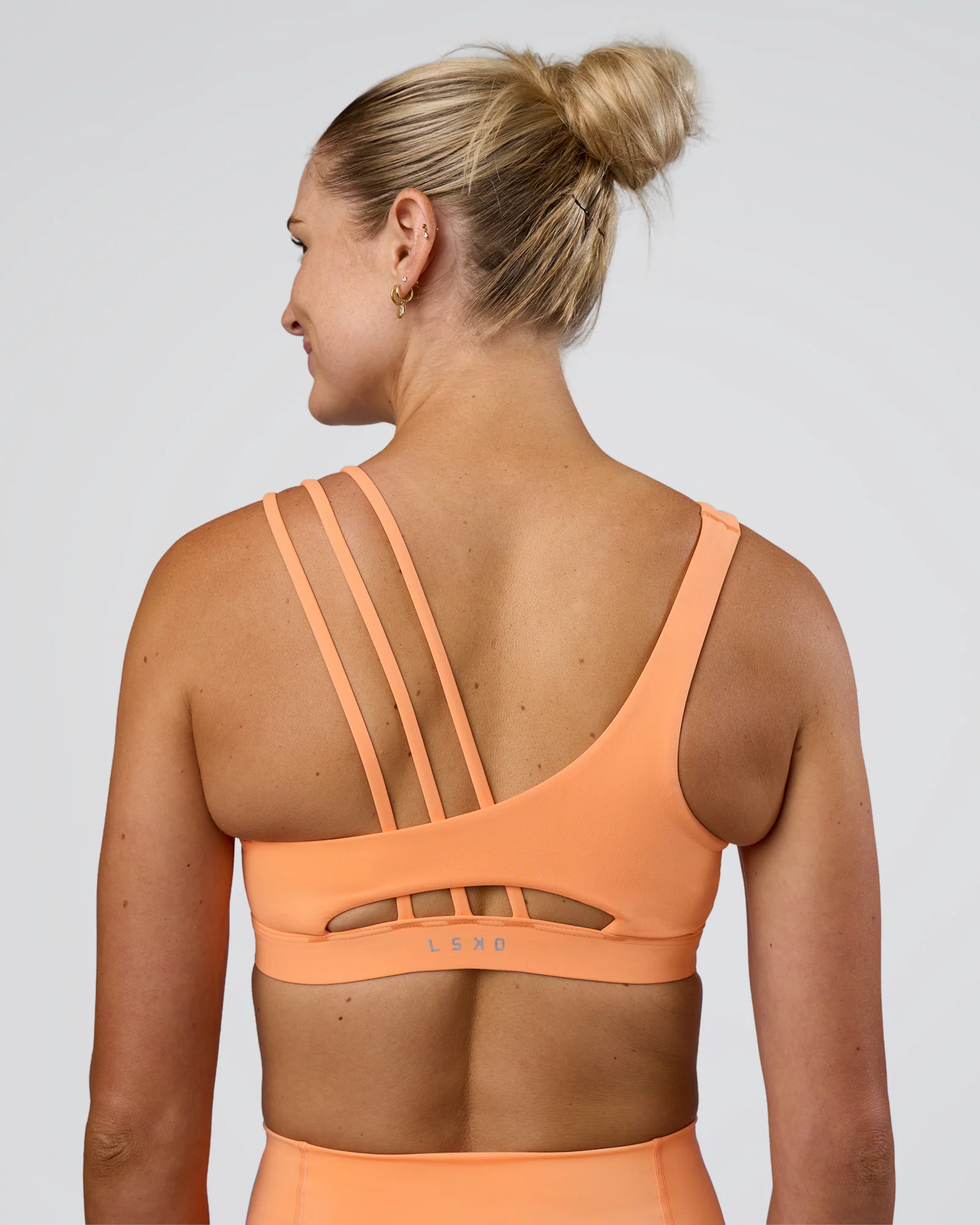 6732-galvanise-splice-sports-bra-cantaloupe-2.webp Galvanise Splice Sports Bra - Cantaloupe