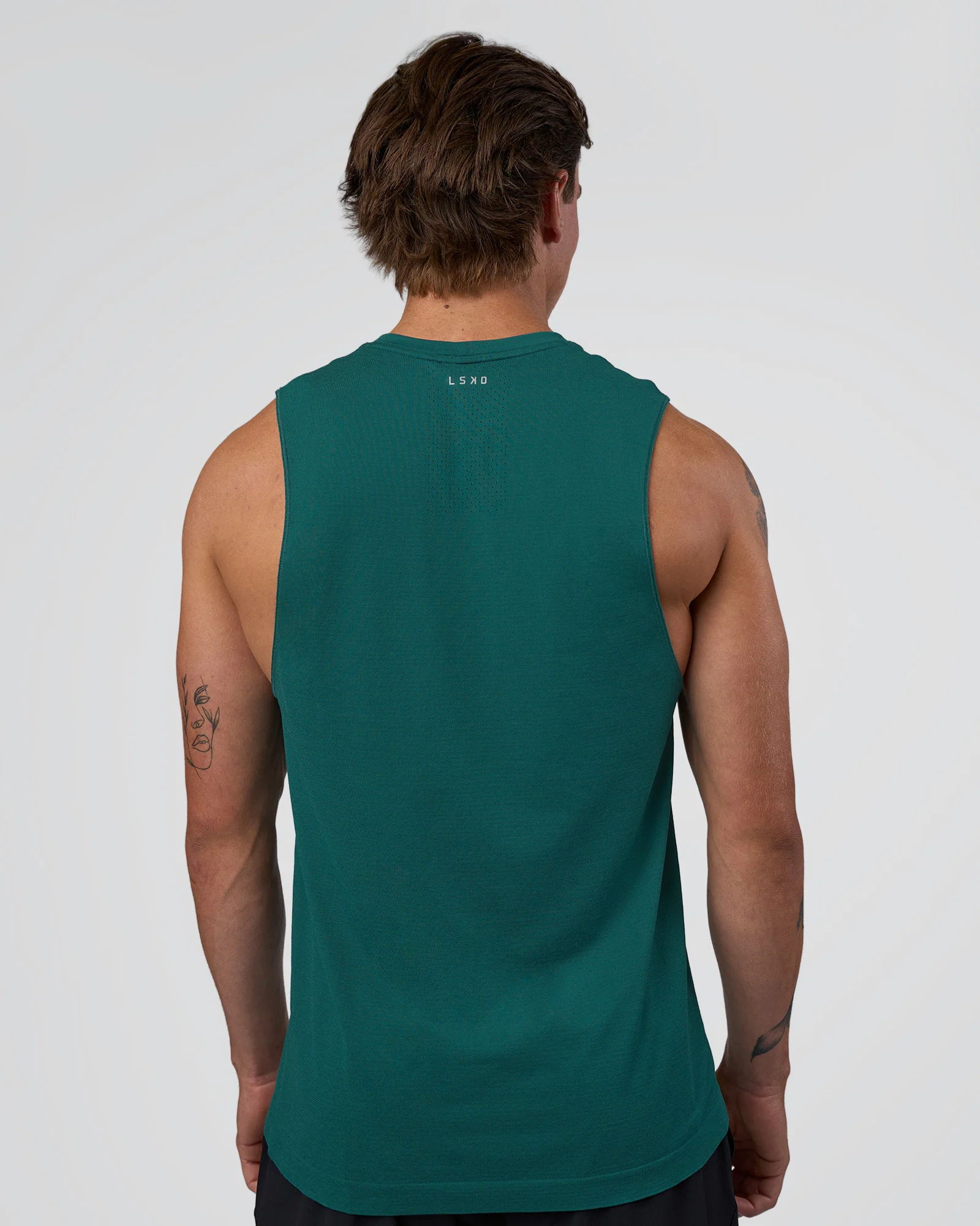 7001-aeroflx-seamless-muscle-tank-transformative-teal-transformative-teal-3.webp AeroFLX+ Seamless Muscle Tank - Transformative Teal/Transformative Teal