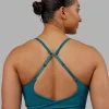 7019-twist-sports-bra-blue-coral-2.webp Twist Sports Bra - Blue Coral