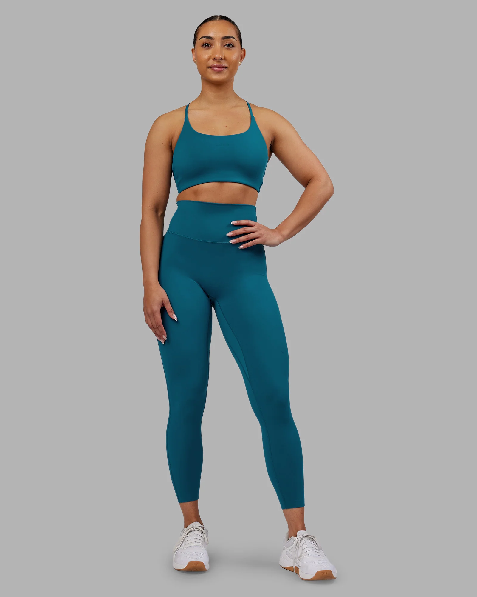7019-twist-sports-bra-blue-coral-3.webp Twist Sports Bra - Blue Coral