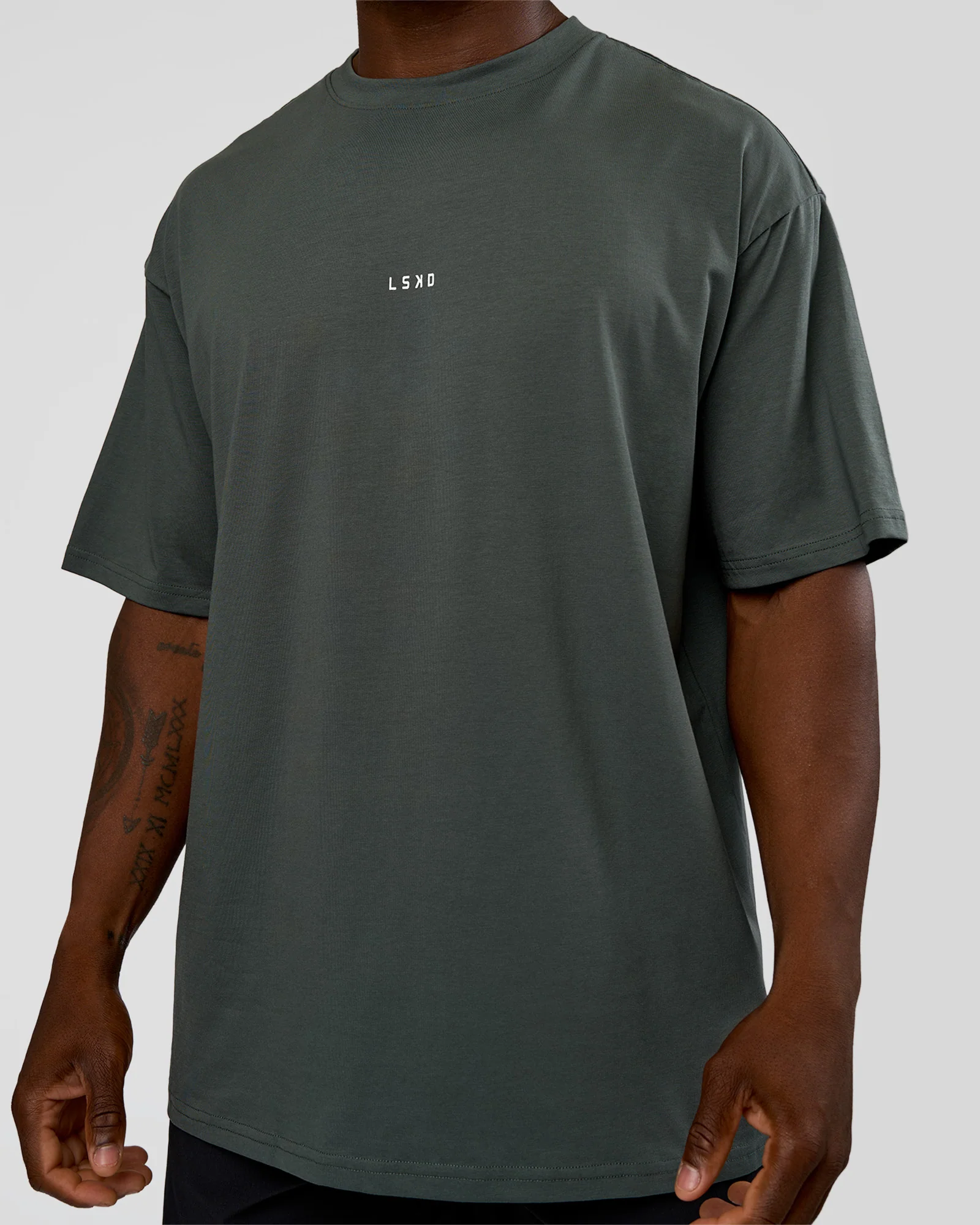 8465-abstract-haze-flxcotton-tee-carbon-green-cantaloupe-7.webp Abstract Haze FLXCotton Tee - Carbon Green-Cantaloupe