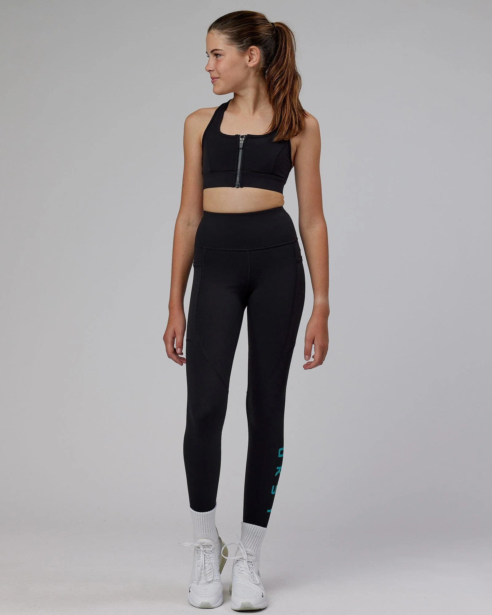 8509-rep-7-8-length-tight-black-hyper-teal-1.webp Rep 7/8 Length Tight - Black-Hyper Teal